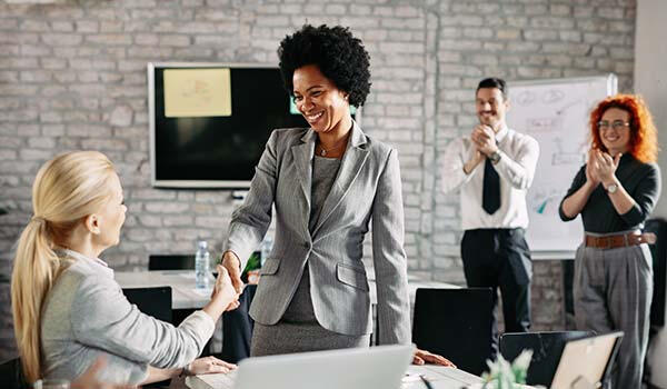 Office workers celebrating